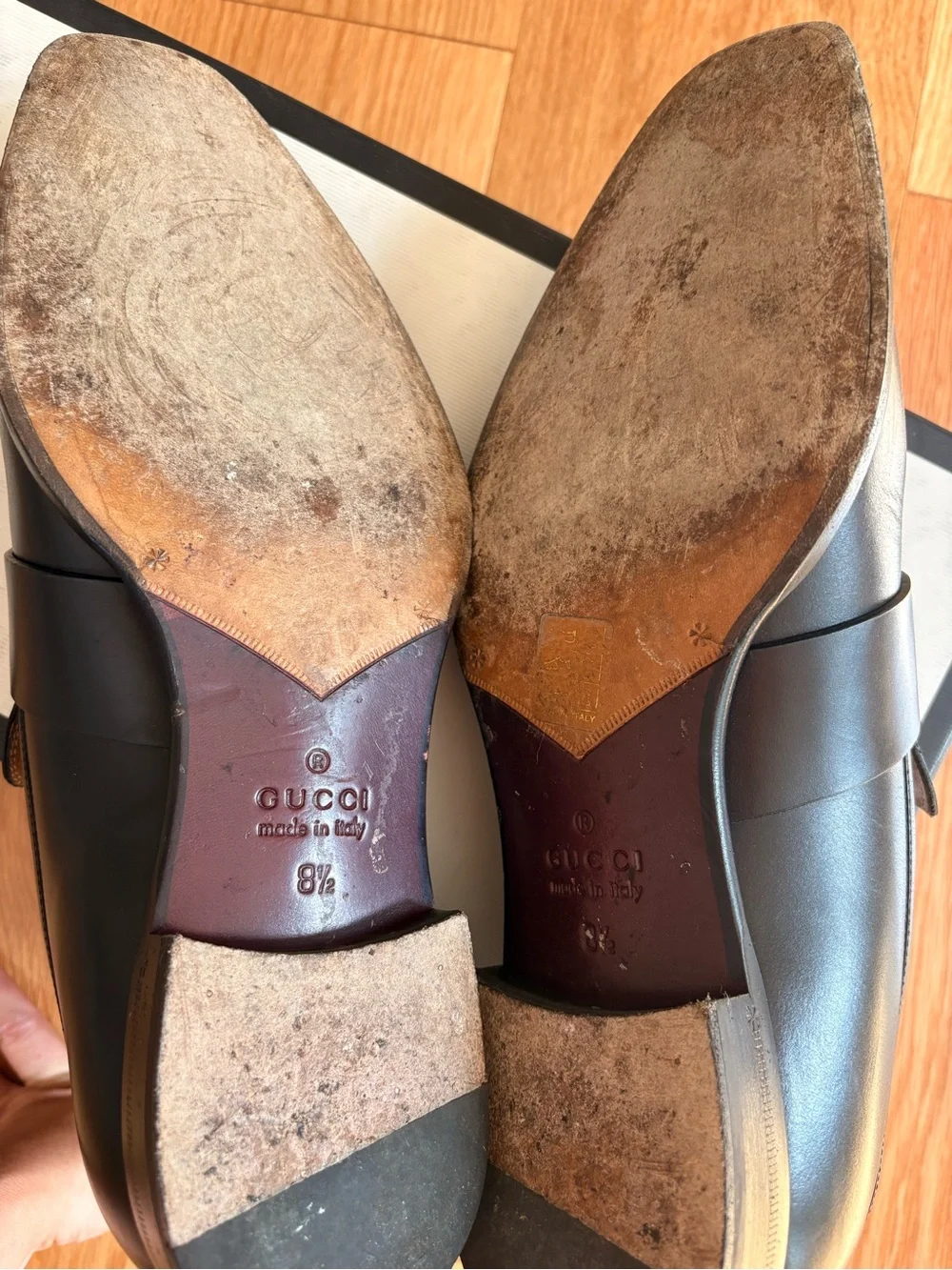 Gucci Black Leather Penny Loafers with Gold Accent
